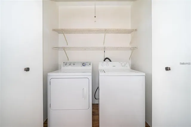 a utility room with dryer and washer
