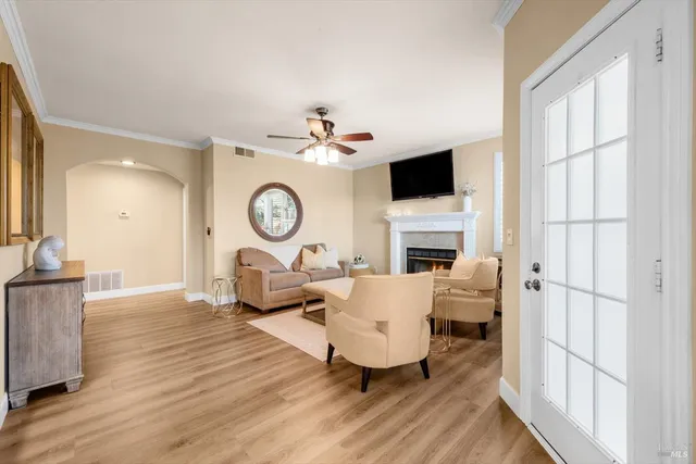 a kitchen with stainless steel appliances granite countertop a stove refrigerator sink and cabinets