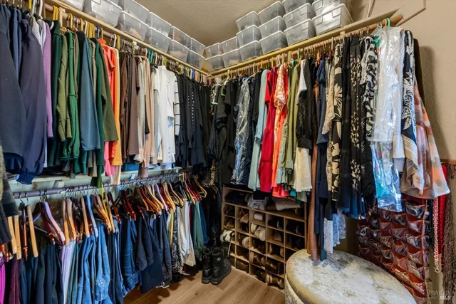 a view of backyard with sitting area