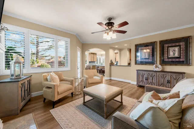 a kitchen with sink stove and cabinets
