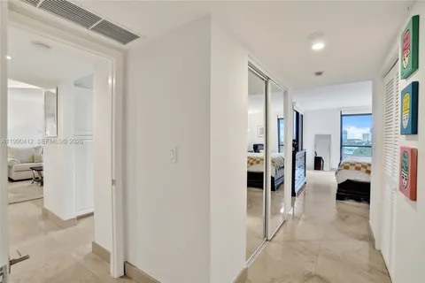 a bathroom with a tub and a bathroom