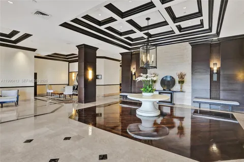 a kitchen with a sink and a stove top oven