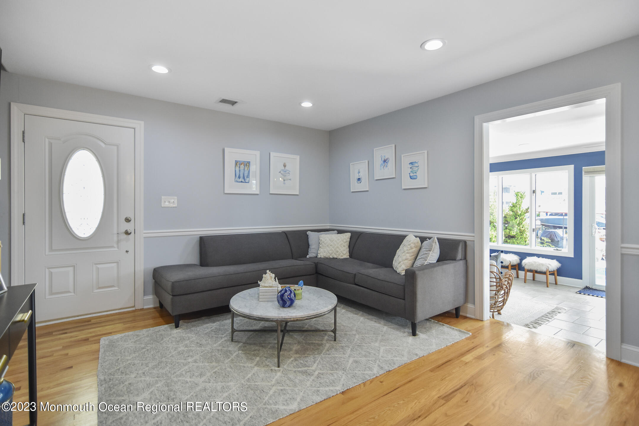8 Rochester Drive Brick, NJ 08723 - Photo 4 of 41 a living room with furniture a rug and a large window