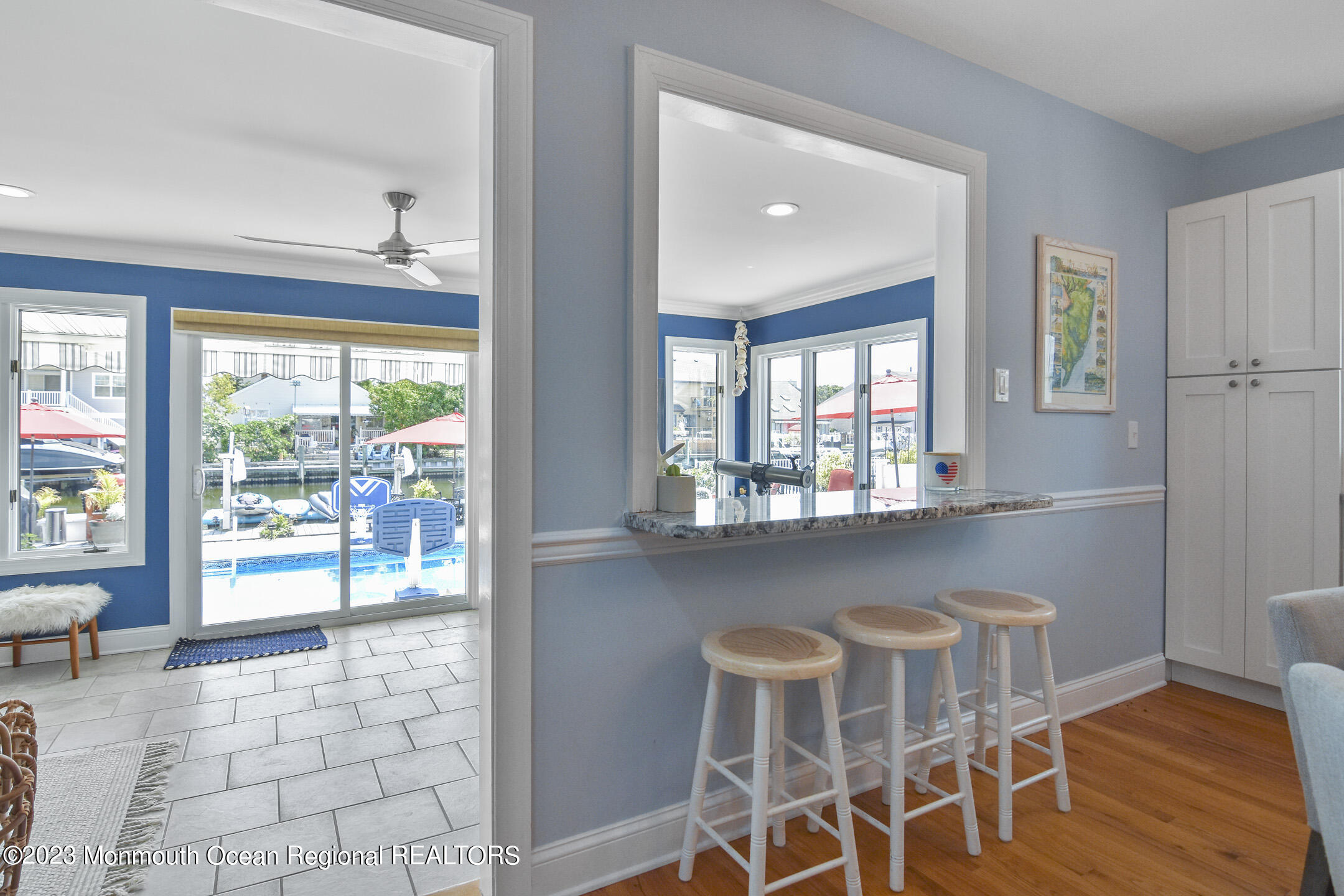 8 Rochester Drive Brick, NJ 08723 - Photo 10 of 41 a dining room with furniture a chandelier and wooden floor