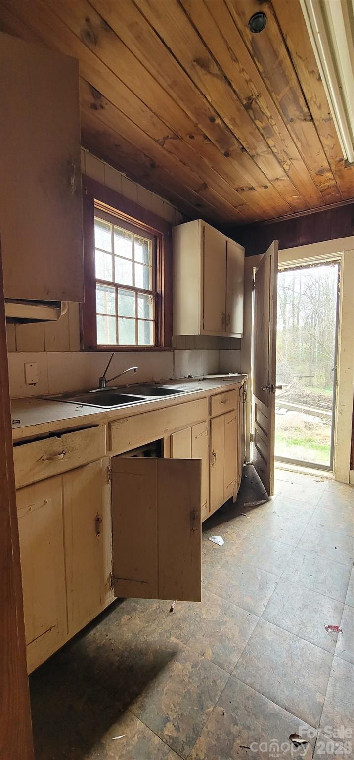1939 River Road Lincolnton, NC 28092 - Photo 11 of 23 a kitchen with a sink stove and cabinets