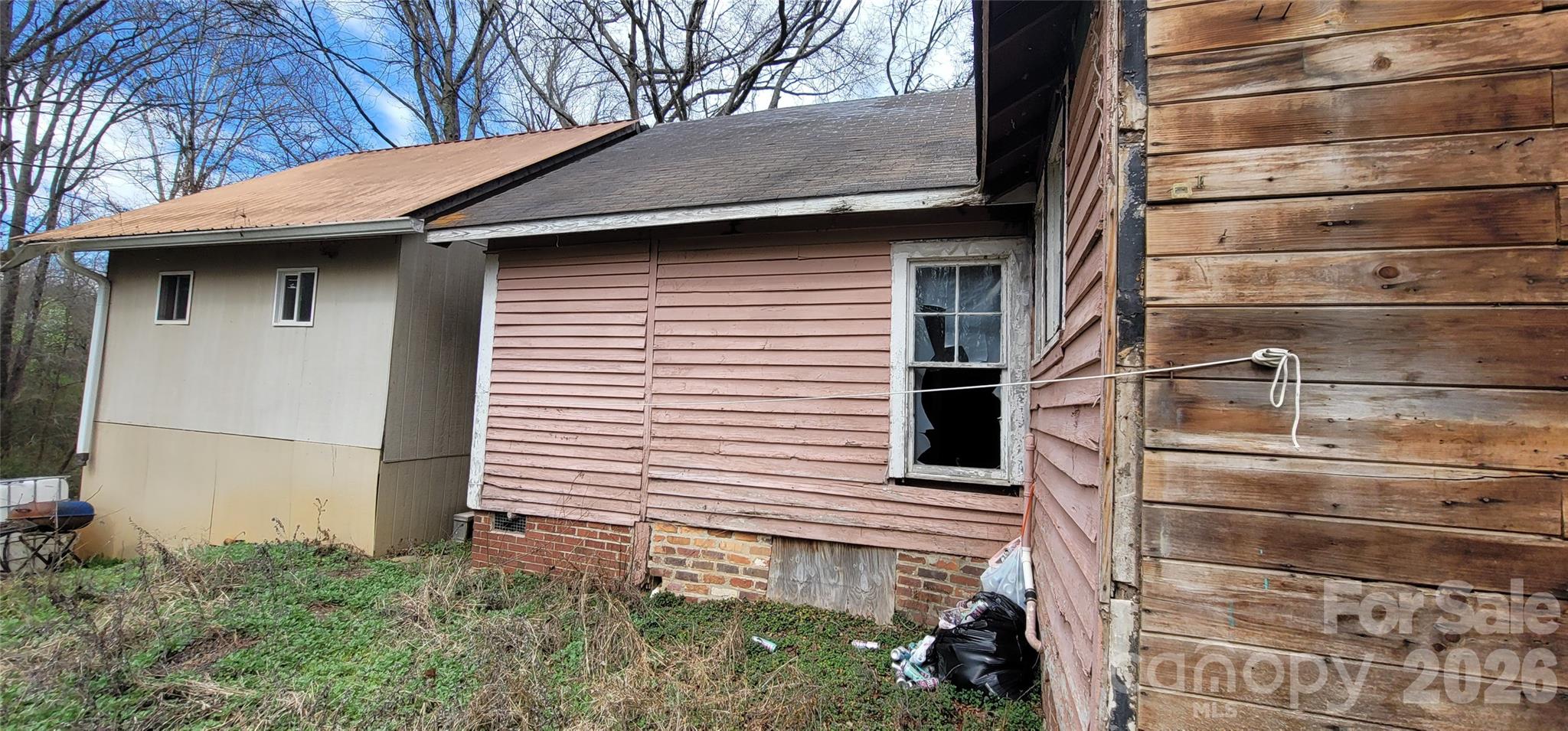 1939 River Road Lincolnton, NC 28092 - Photo 15 of 23 a side view of a house with a garage
