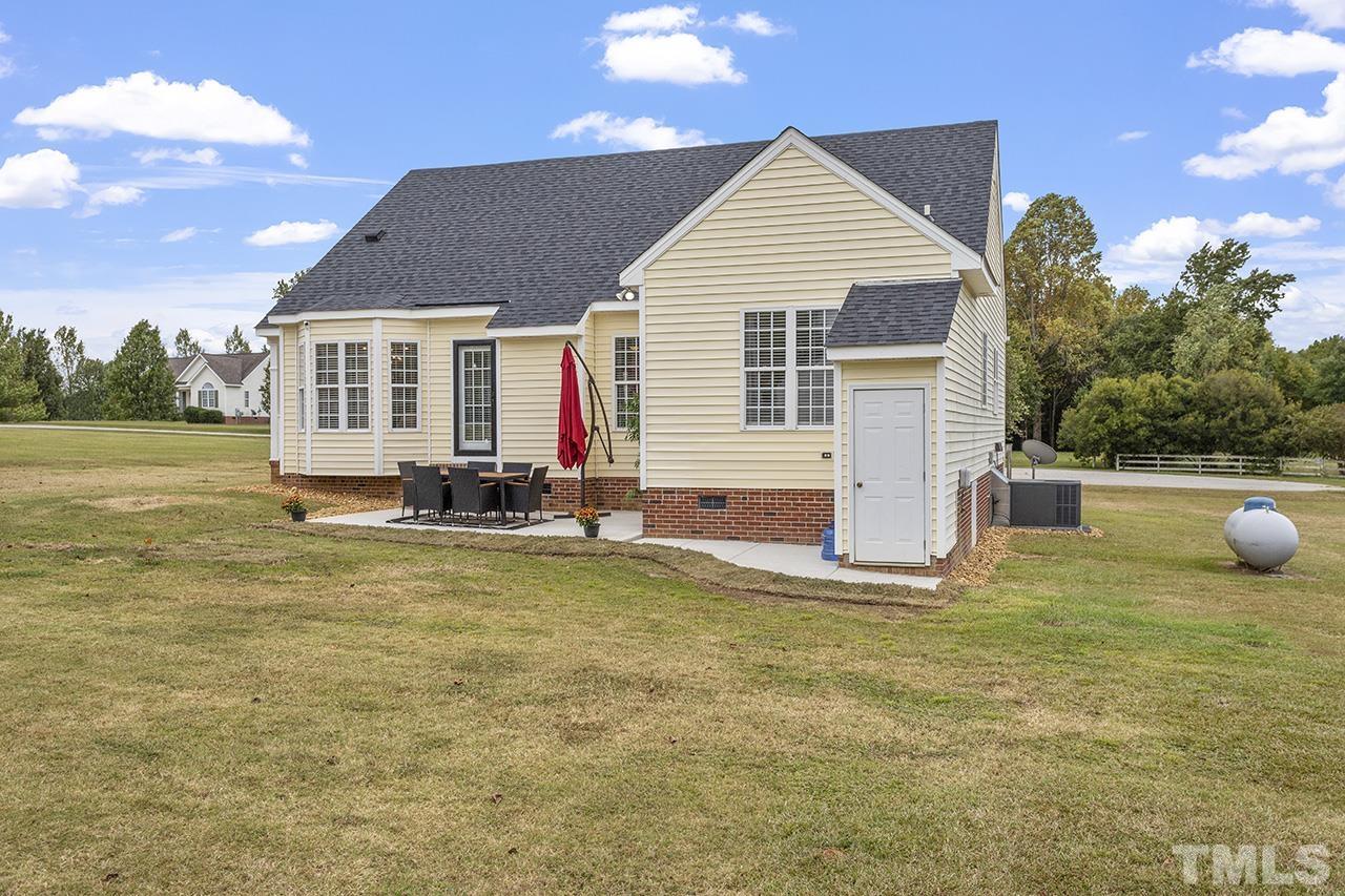 6652 Madison Road Bailey, NC 27807 - Photo 33 of 34 a view of a house with a yard