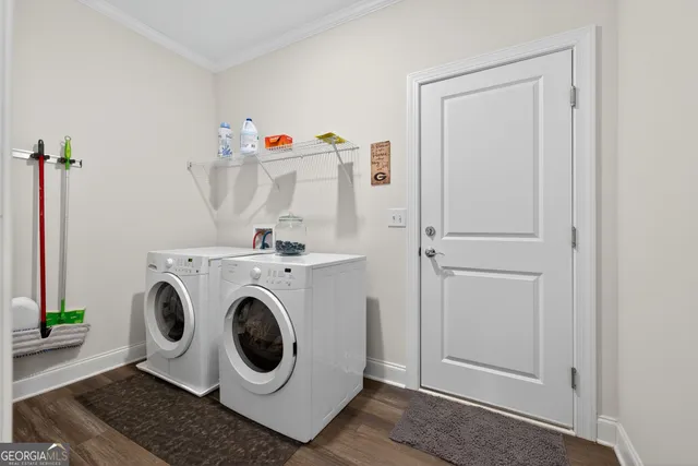 a utility room with dryer and washer