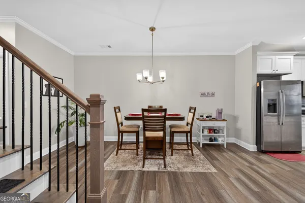 a view of a dining room with furniture