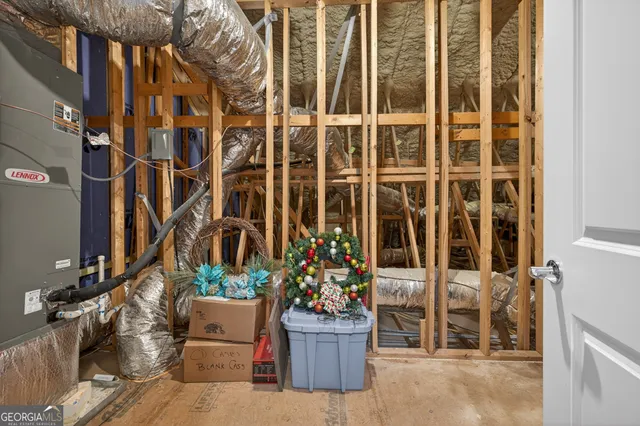 front view of a house with a potted plant and a potted plant