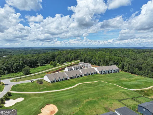 a view of a house with a big yard