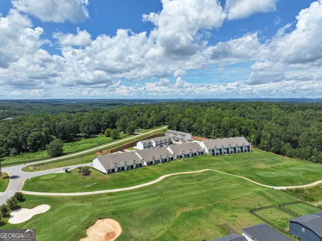 a view of a house with a big yard