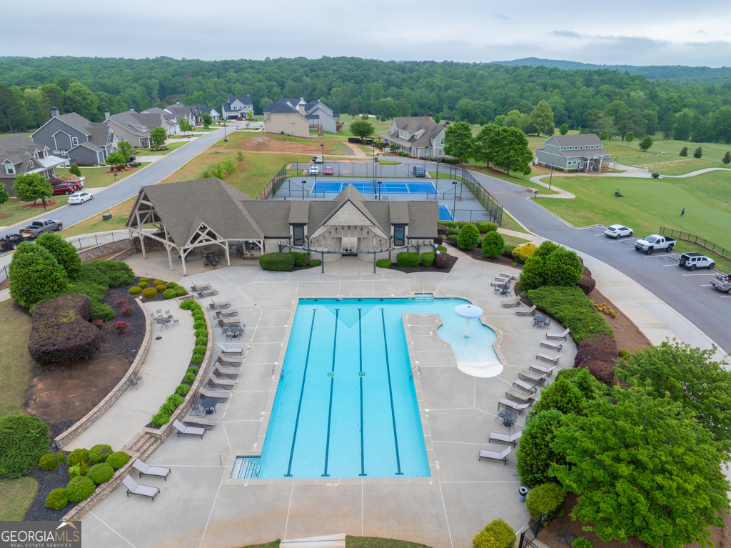110 Magnolia Place Homer, GA 30547 - Photo 38 of 42 an aerial view of a house with a swimming pool yard and outdoor seating