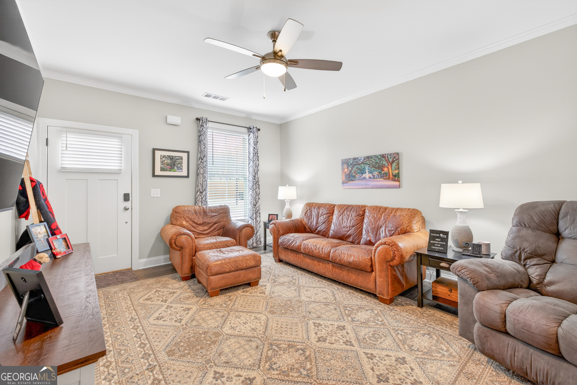 110 Magnolia Place Homer, GA 30547 - Photo 4 of 42 a living room with furniture and a flat screen tv