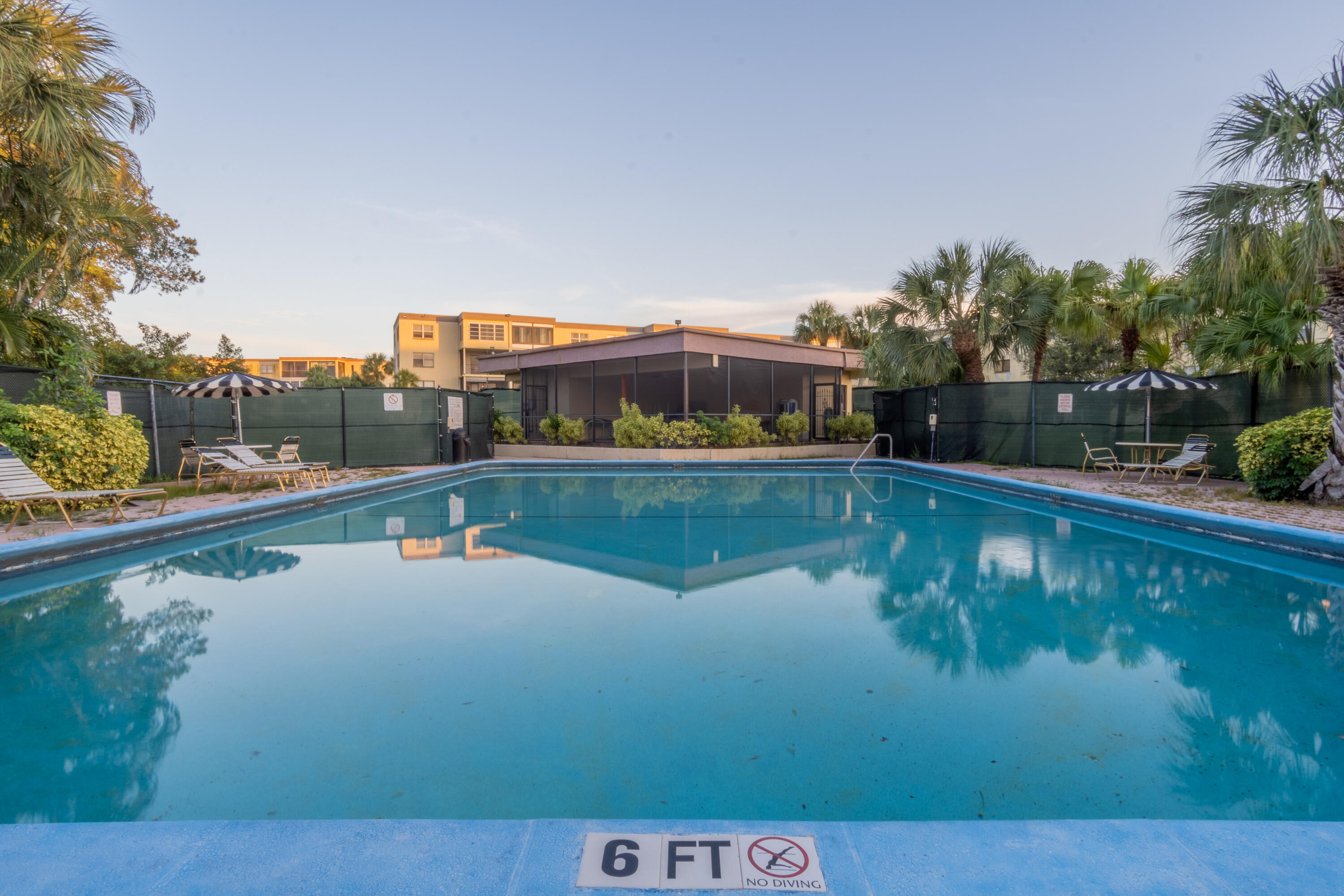9355 Southwest 8th Street, Unit 406 Boca Raton, FL 33428 - Photo 21 of 22 a view of a lake in a yard
