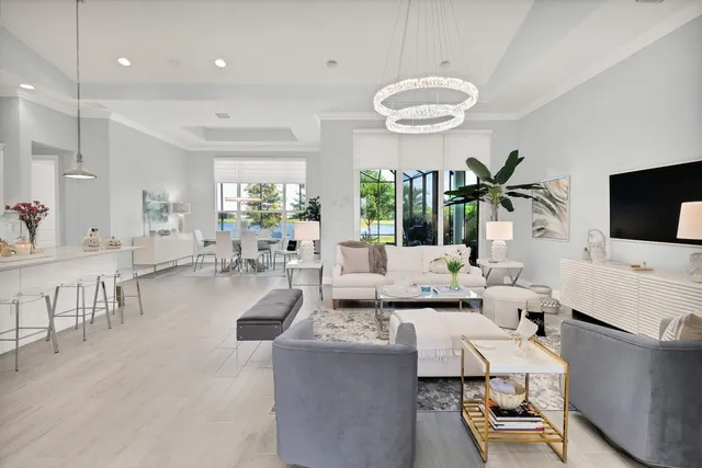 a living room with fireplace furniture and a flat screen tv