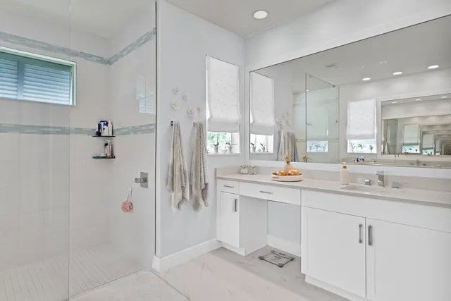 a kitchen with a sink and refrigerator