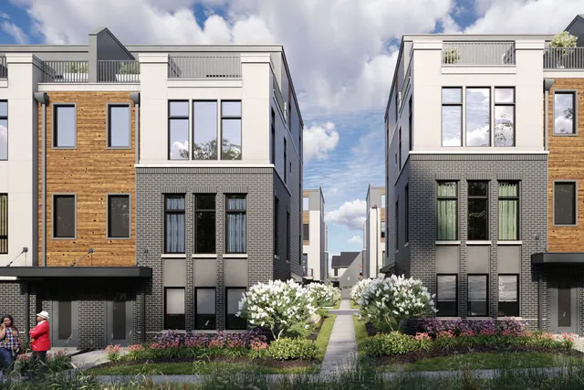 a front view of a multi story residential apartment building