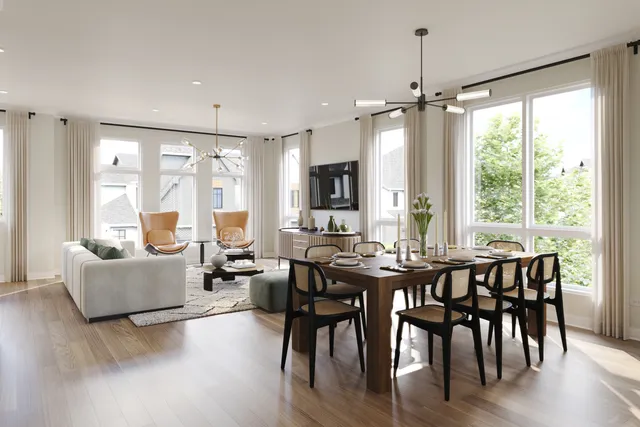a view of a a dining room with furniture window and wooden floor