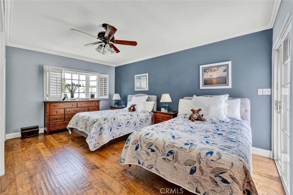 5456 Cadbury Road Whittier, CA 90601 - Photo 23 of 67 a bedroom with two beds and painting on the wall