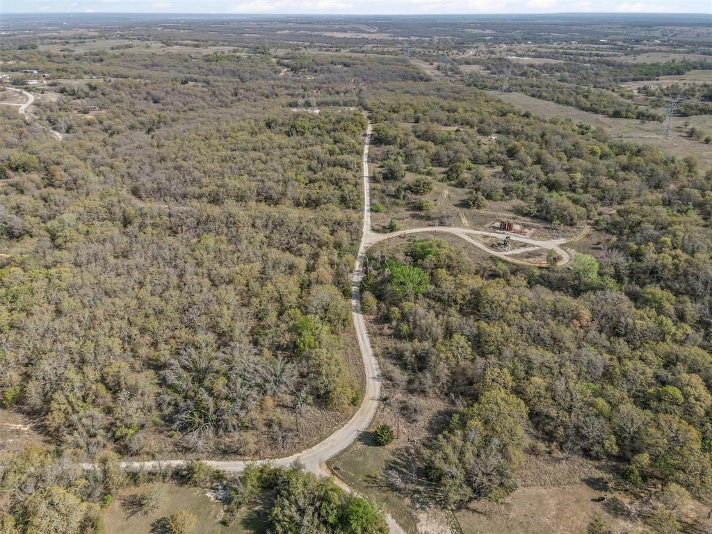 5 County Road 3855 Poolville, TX 76487 - Photo 14 of 16 a view of a bathroom with a dry yard