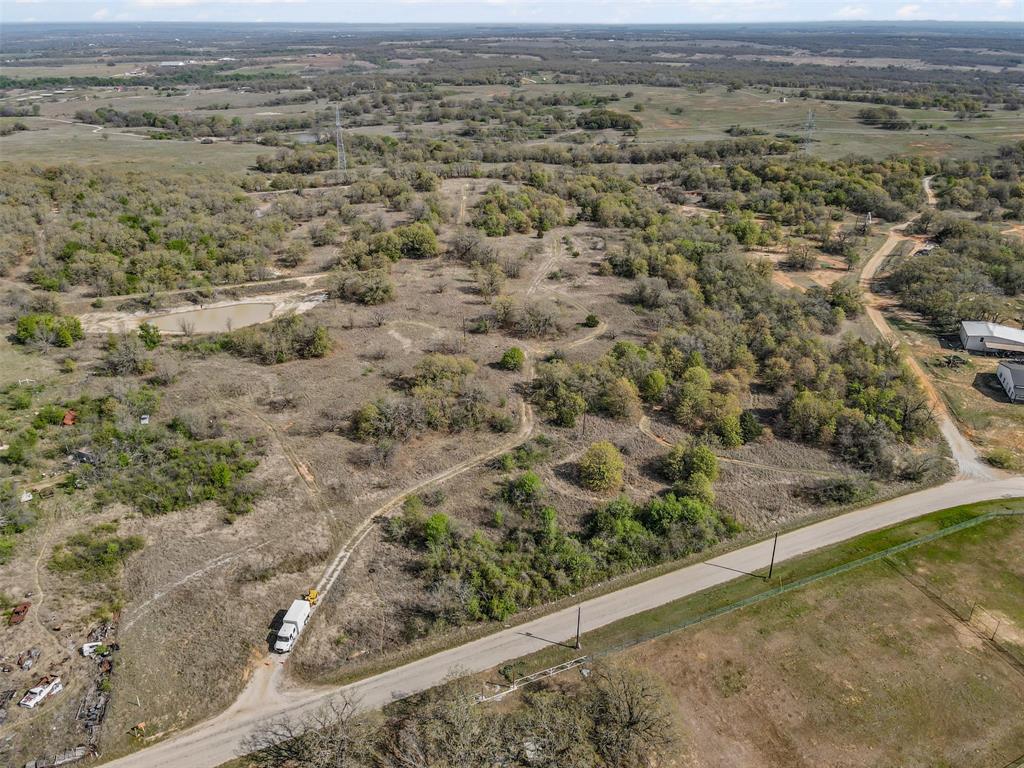 5 County Road 3855 Poolville, TX 76487 - Photo 2 of 16 an aerial view of mountain