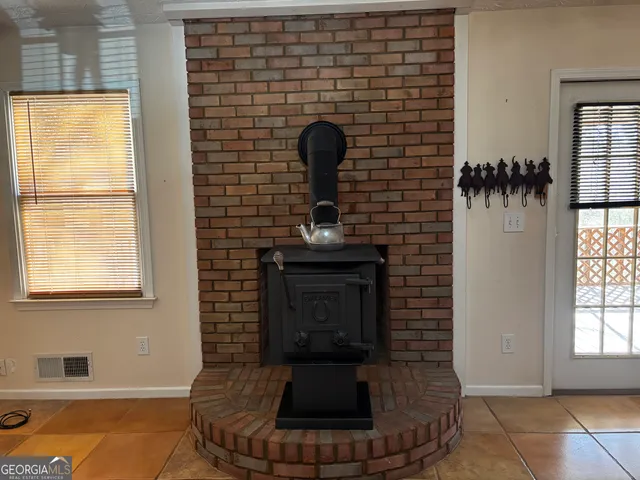 a living room with a fireplace