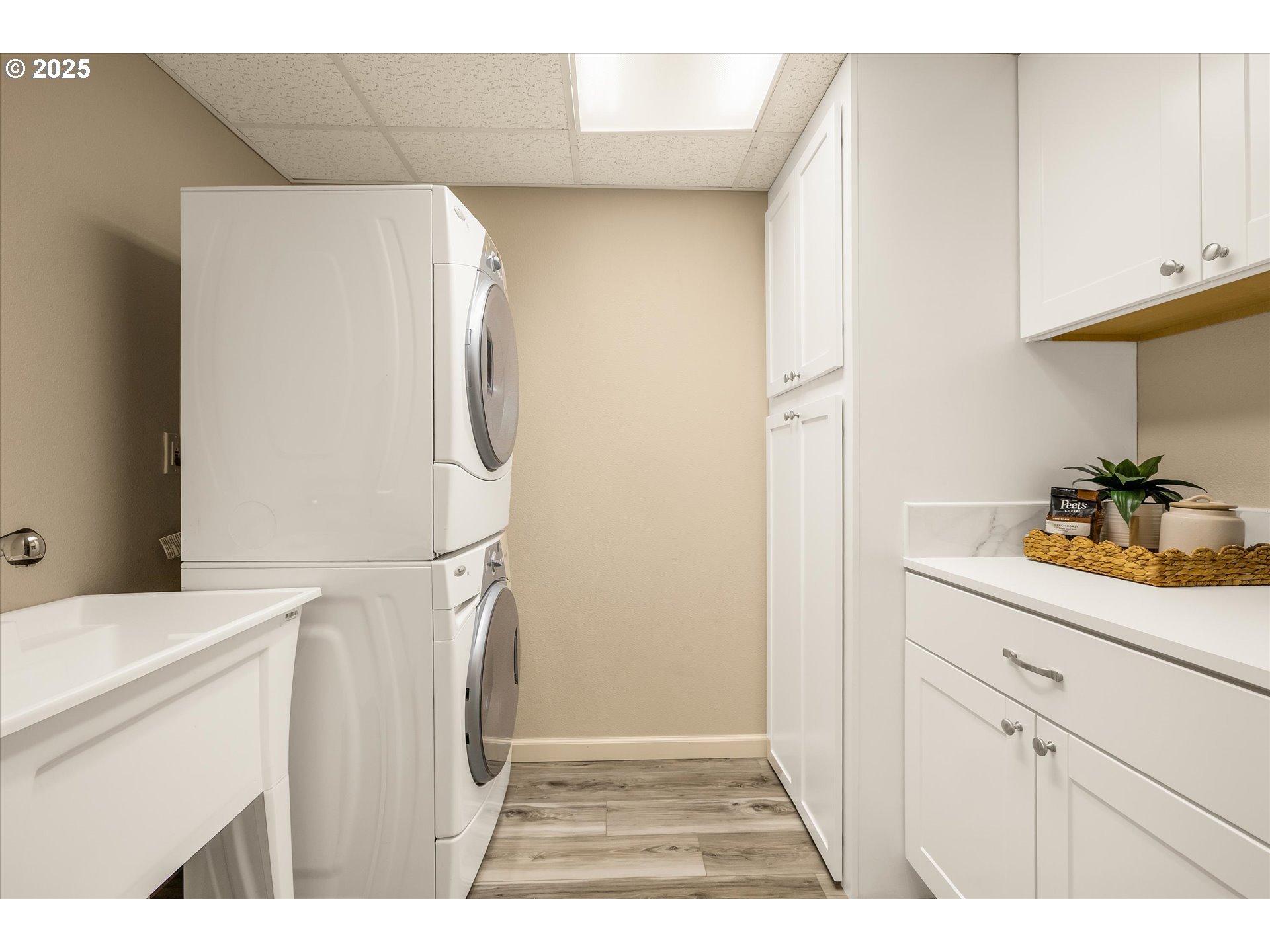 20475 Southeast Baty Road Sandy, OR 97055 - Photo 18 of 40 a utility room with cabinets washer and dryer