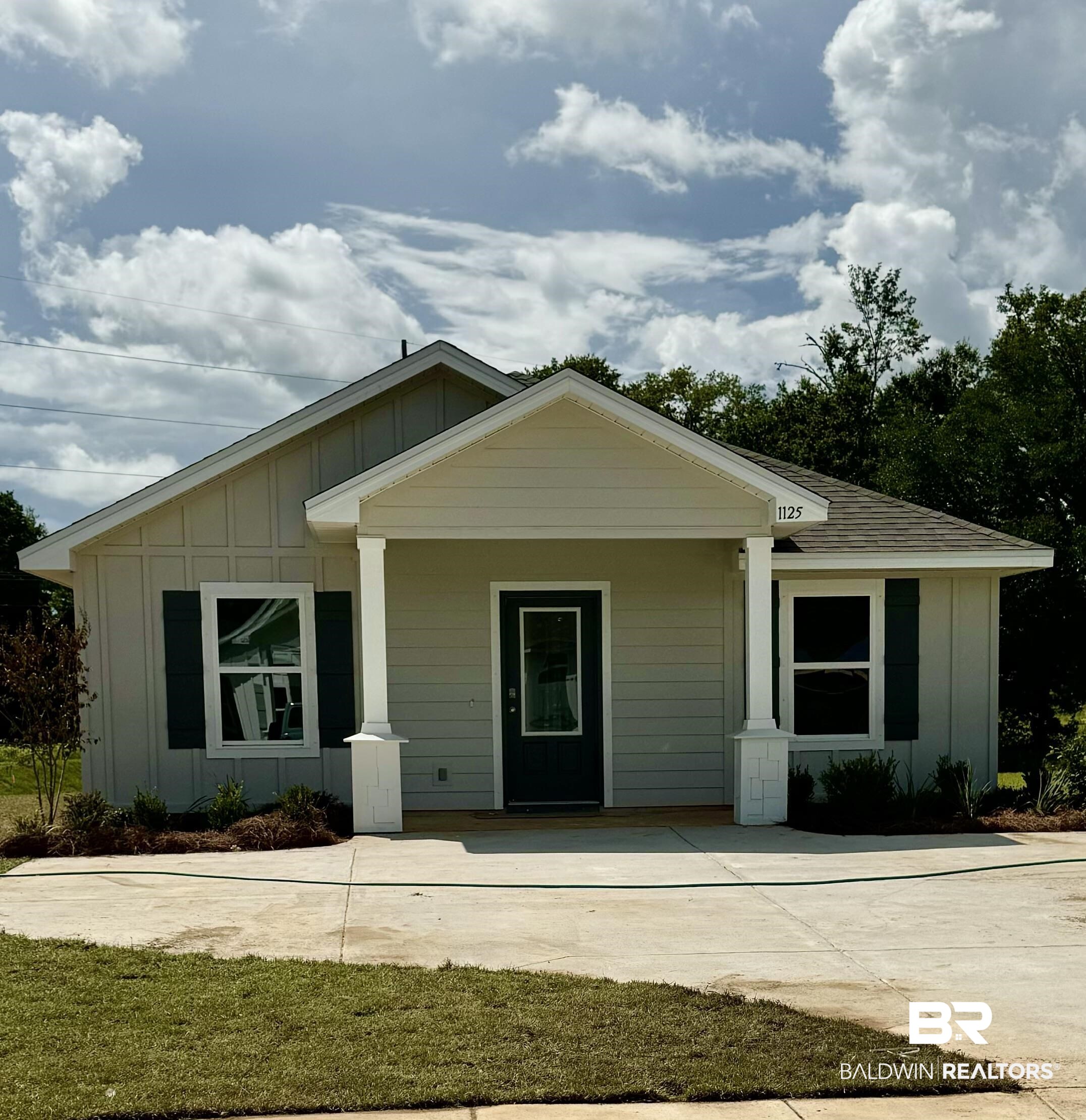 1125 Sweet Laurel Street Foley, AL 36535 - Photo 1 of 1 View of front of house with covered porch