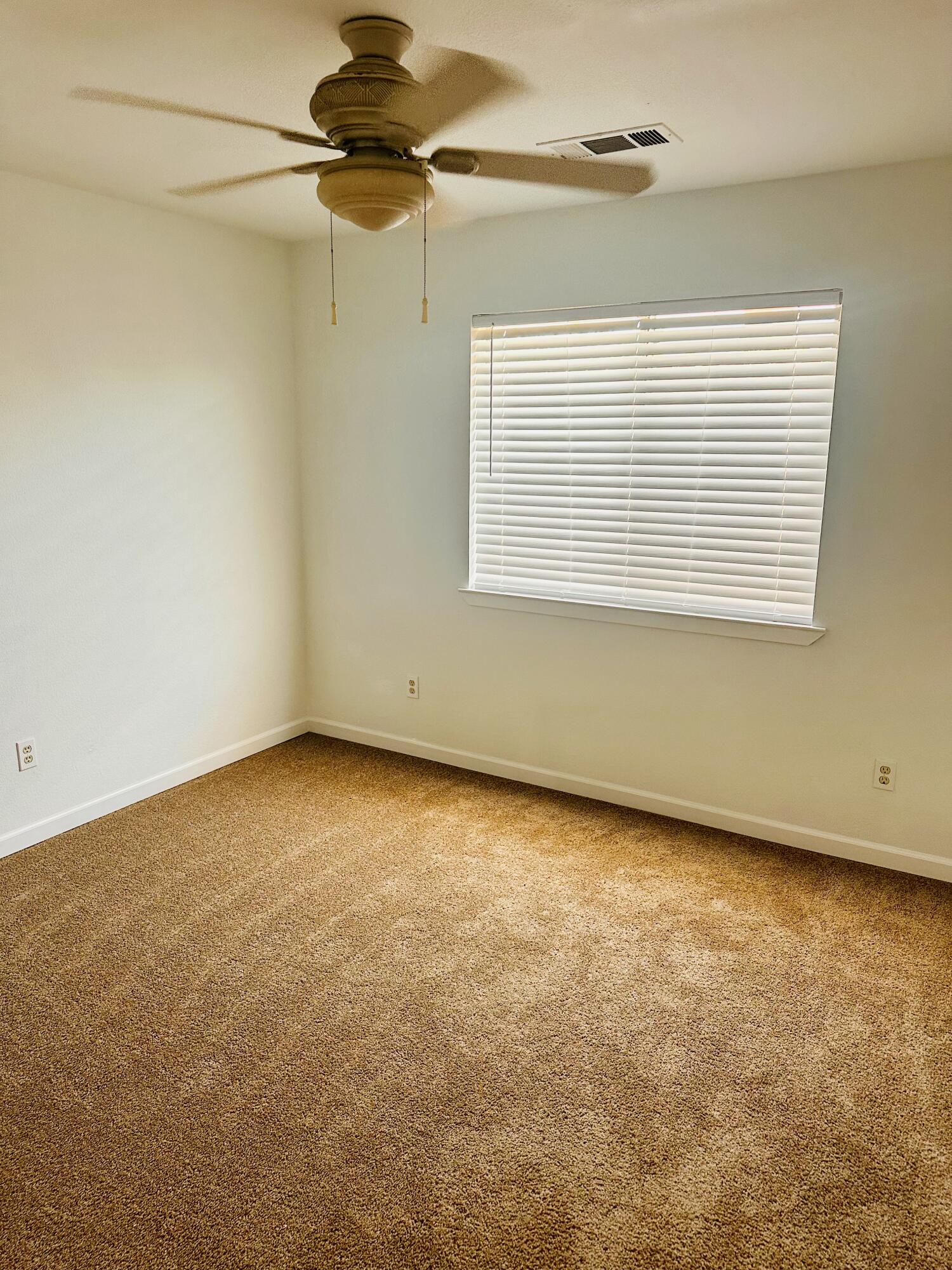 30880 Farr Road Visalia, CA 93291 - Photo 16 of 27 an empty room with a window