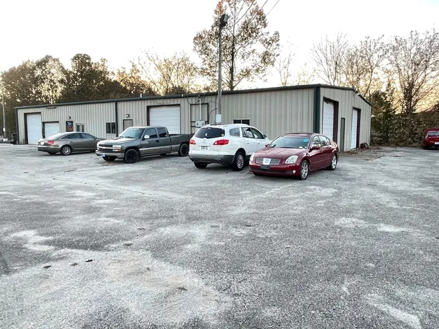 a view of a house with backyard and deck