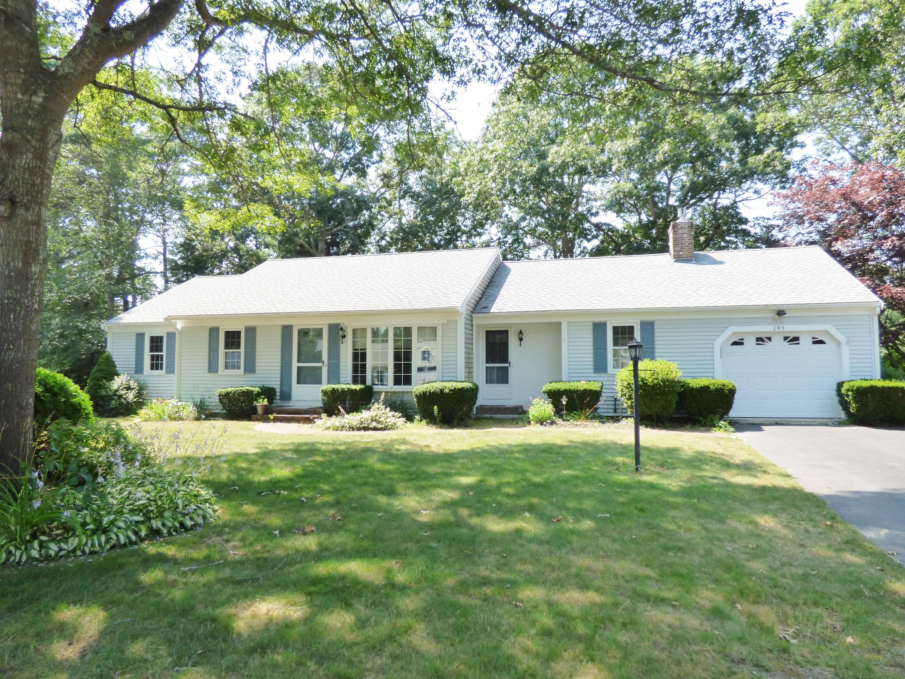 195 Ansel Howland Road Centerville, MA 02632 - Photo 1 of 22 a view of a house with backyard and sitting area