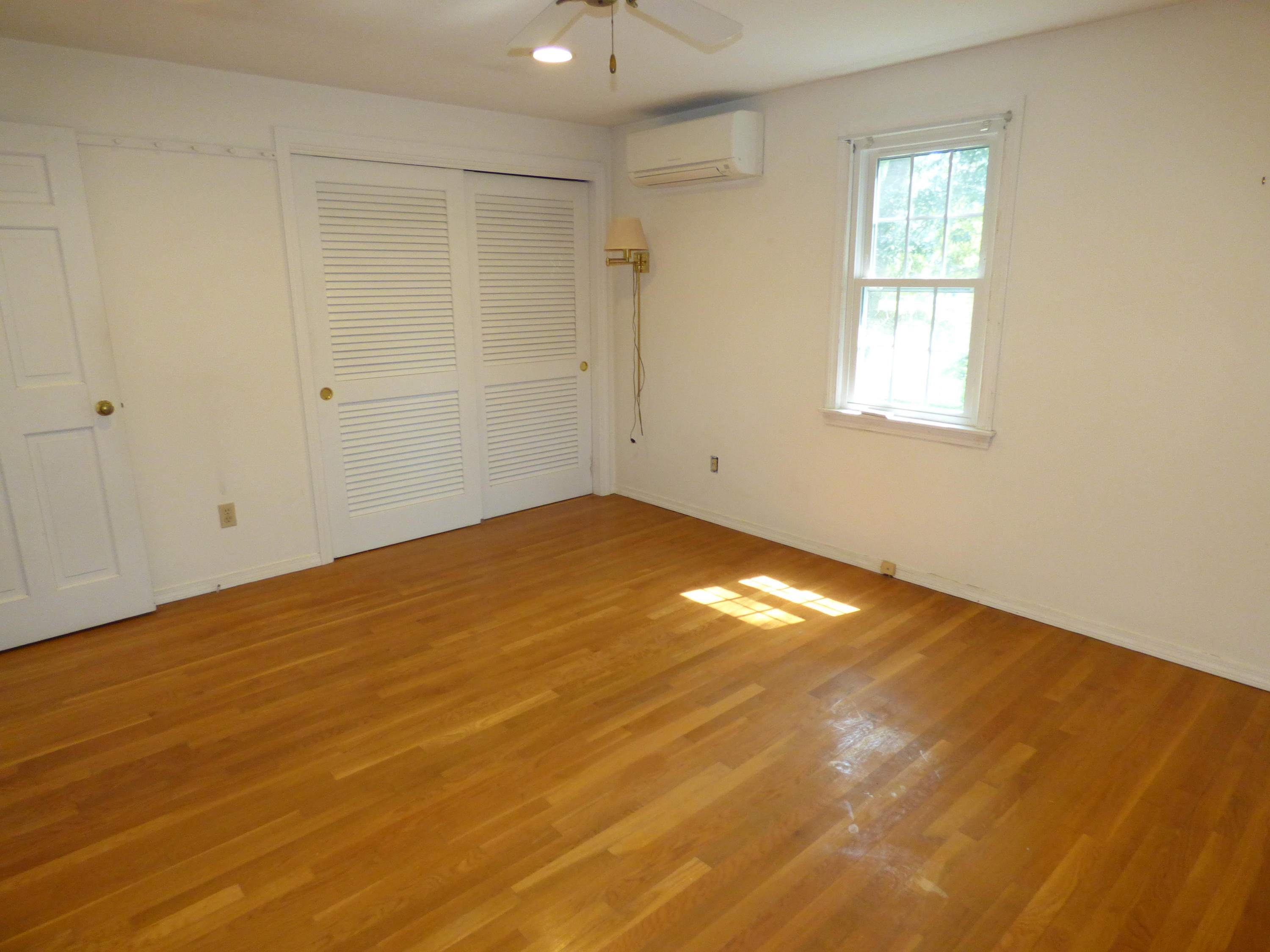 195 Ansel Howland Road Centerville, MA 02632 - Photo 10 of 22 a view of empty room with window