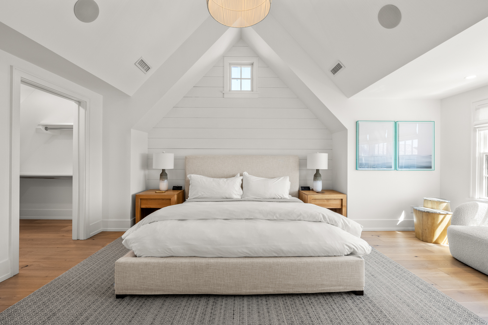 174 Cliff Road Nantucket, MA 02554 - Photo 24 of 49 a bedroom with a bed and wooden floor