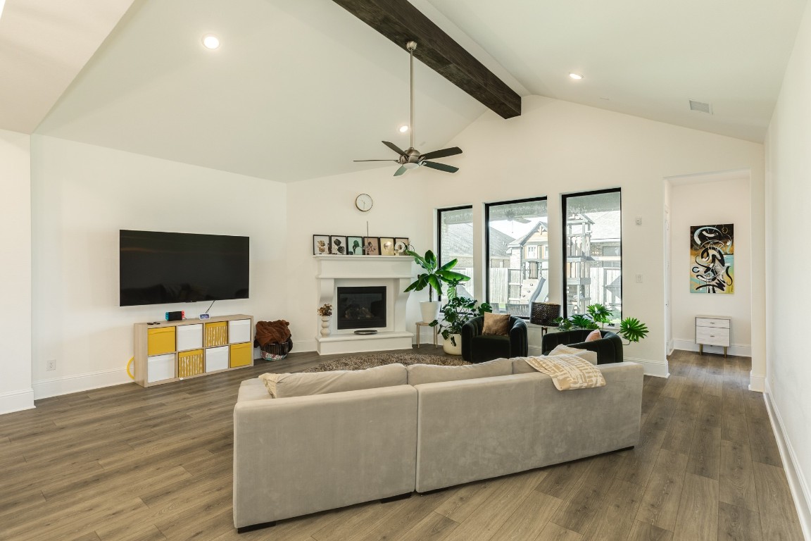 10102 Brush Way Rosharon, TX 77583 - Photo 12 of 50 The family room is exceptionally spacious, ideal for entertaining guests or accommodating a large family.