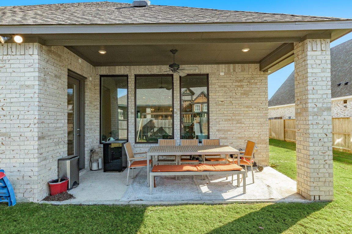 10102 Brush Way Rosharon, TX 77583 - Photo 36 of 50 Covered patio with recessed lighting, perfect for outdoor entertaining and relaxation.