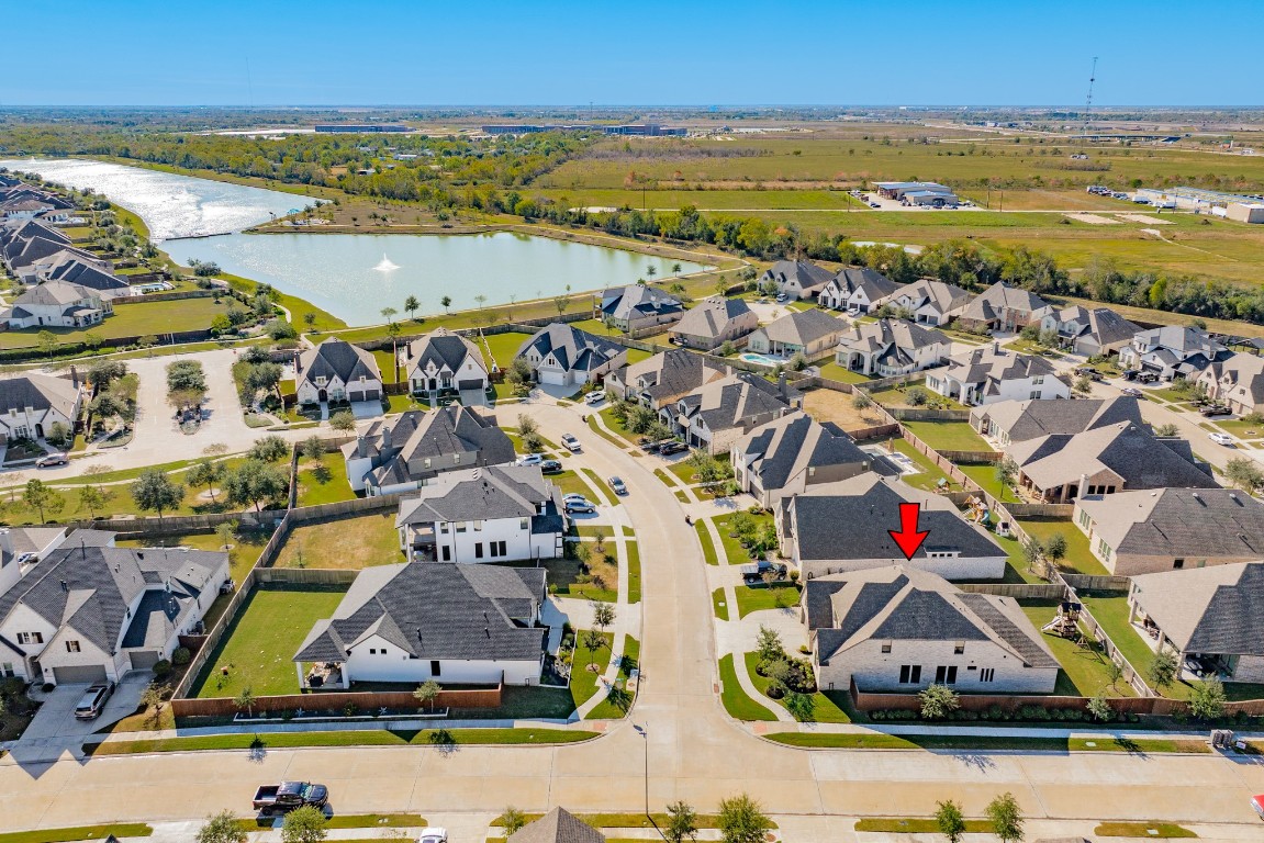 10102 Brush Way Rosharon, TX 77583 - Photo 42 of 50 Aerial view of the neighborhood with Adventure Lake in the background. Ideal location for nature enthusiasts and those who enjoy walking.