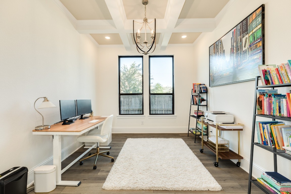 10102 Brush Way Rosharon, TX 77583 - Photo 9 of 50 The office features a spacious layout, modern lighting, and wooden floors.