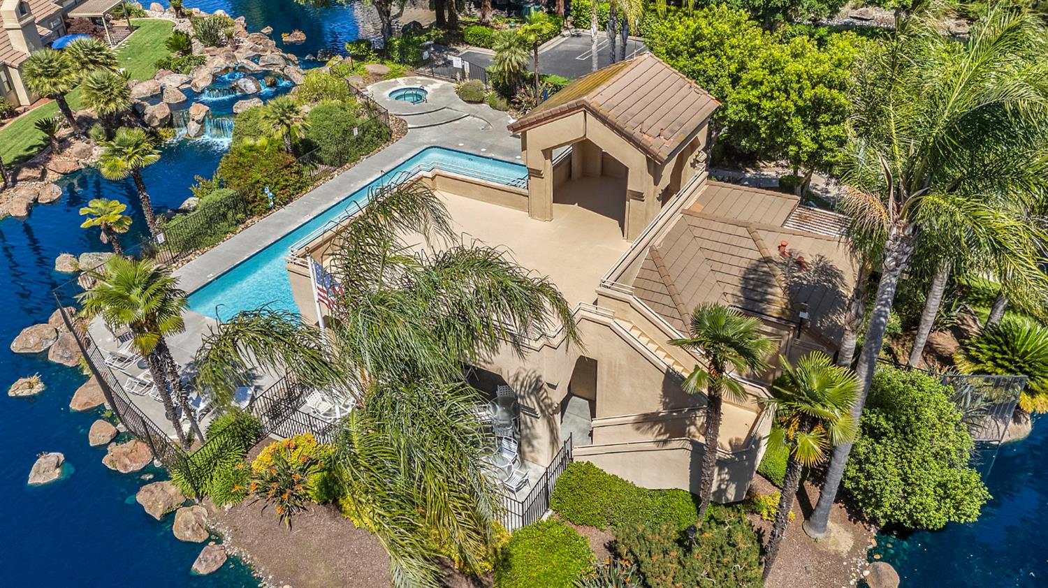 1013 Copper Lake Court Modesto, CA 95355 - Photo 58 of 66 an aerial view of a house with a yard and garden