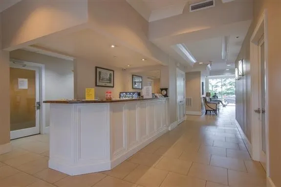a view of a living room and a kitchen