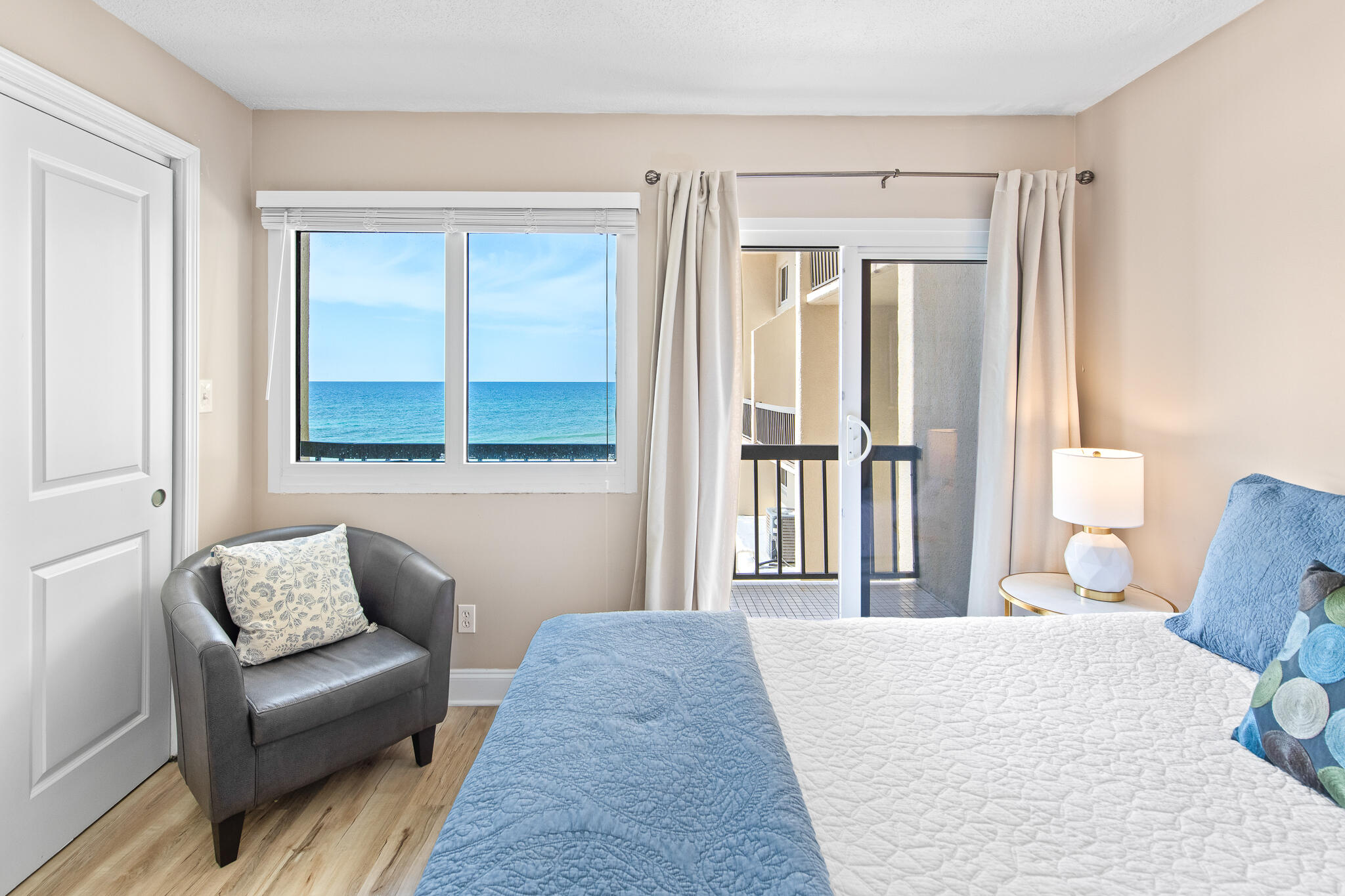 23223 Front Beach Road, Unit 113 Panama City Beach, FL 32413 - Photo 28 of 67 a bedroom with furniture and a window