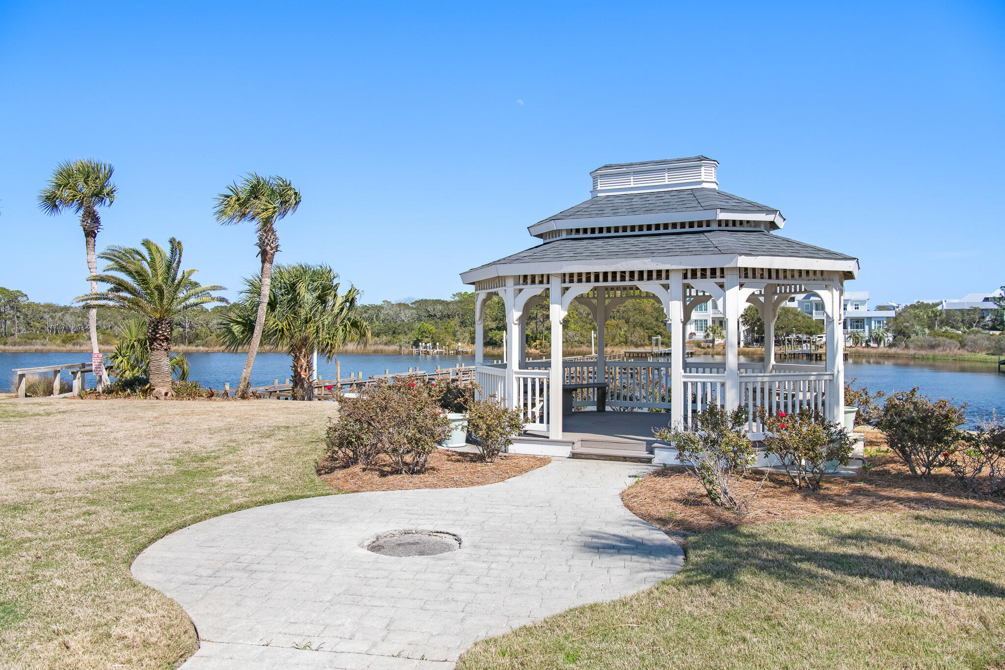 23223 Front Beach Road, Unit 113 Panama City Beach, FL 32413 - Photo 54 of 67 a view of a house with backyard and sitting area