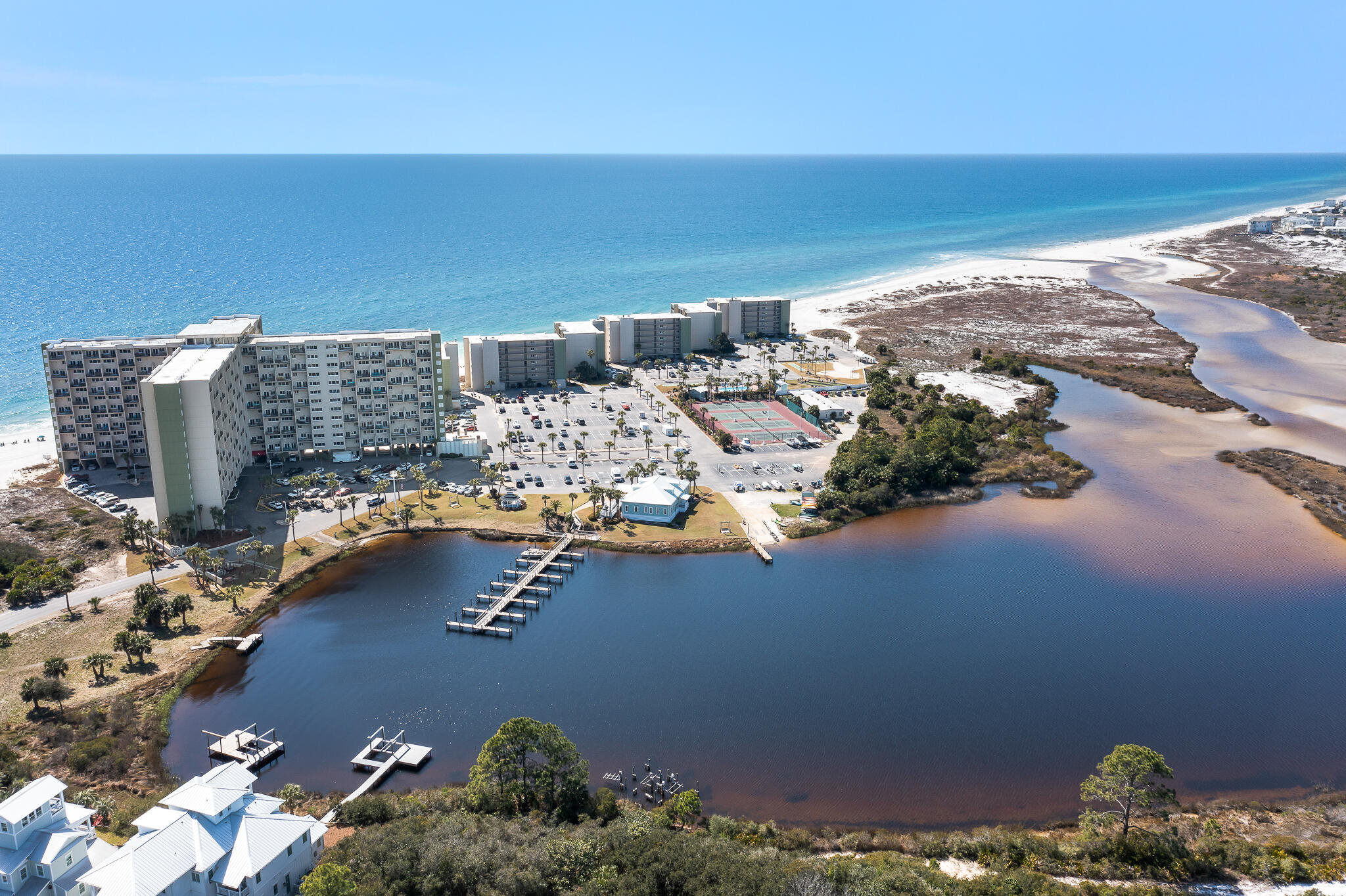 23223 Front Beach Road, Unit 113 Panama City Beach, FL 32413 - Photo 66 of 67 an aerial view of ocean and residential houses
