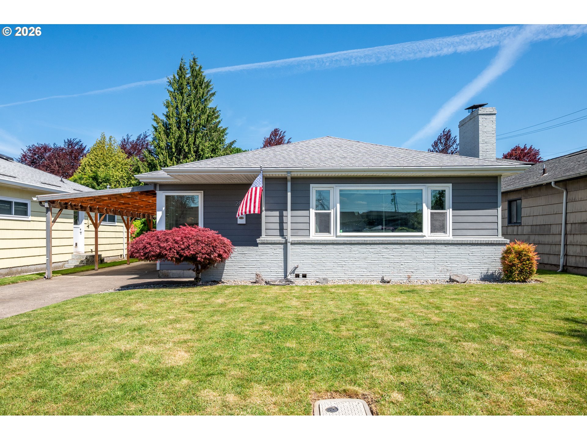 2808 Lilac Street Longview, WA 98632 - Photo 28 of 29 a front view of a house with a yard