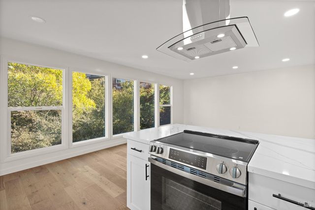 a view of a room with natural light