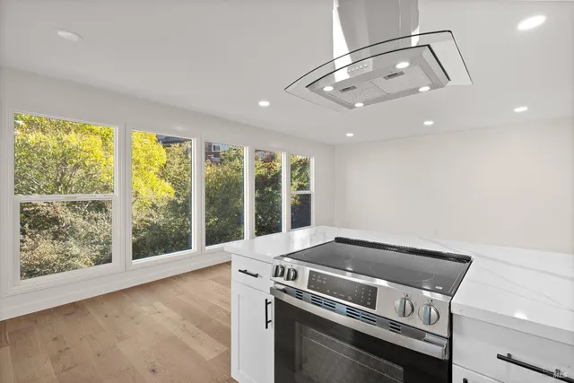 a view of a room with natural light