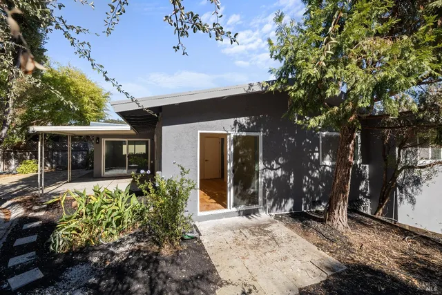 a view of a house with a roof deck