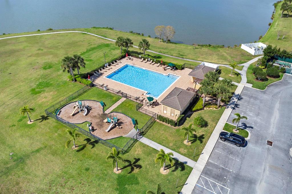 1578 Softshell Street St. Cloud, FL 34771 - Photo 19 of 27 an aerial view of a swimming pool patio swimming pool and outdoor seating