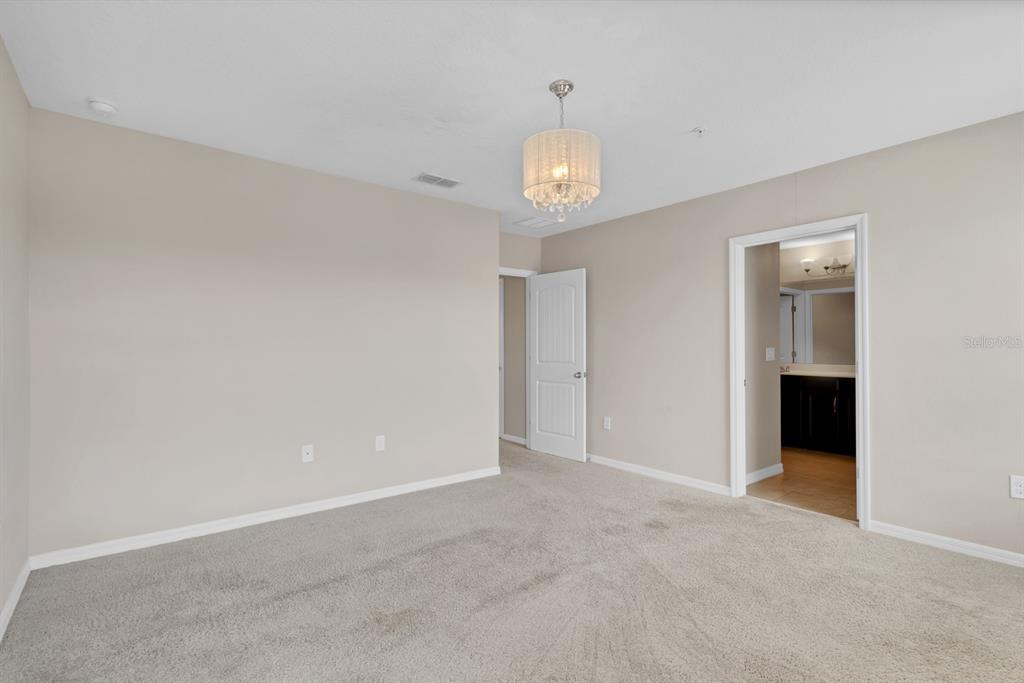 1578 Softshell Street St. Cloud, FL 34771 - Photo 20 of 27 an empty room with a empty space and a window