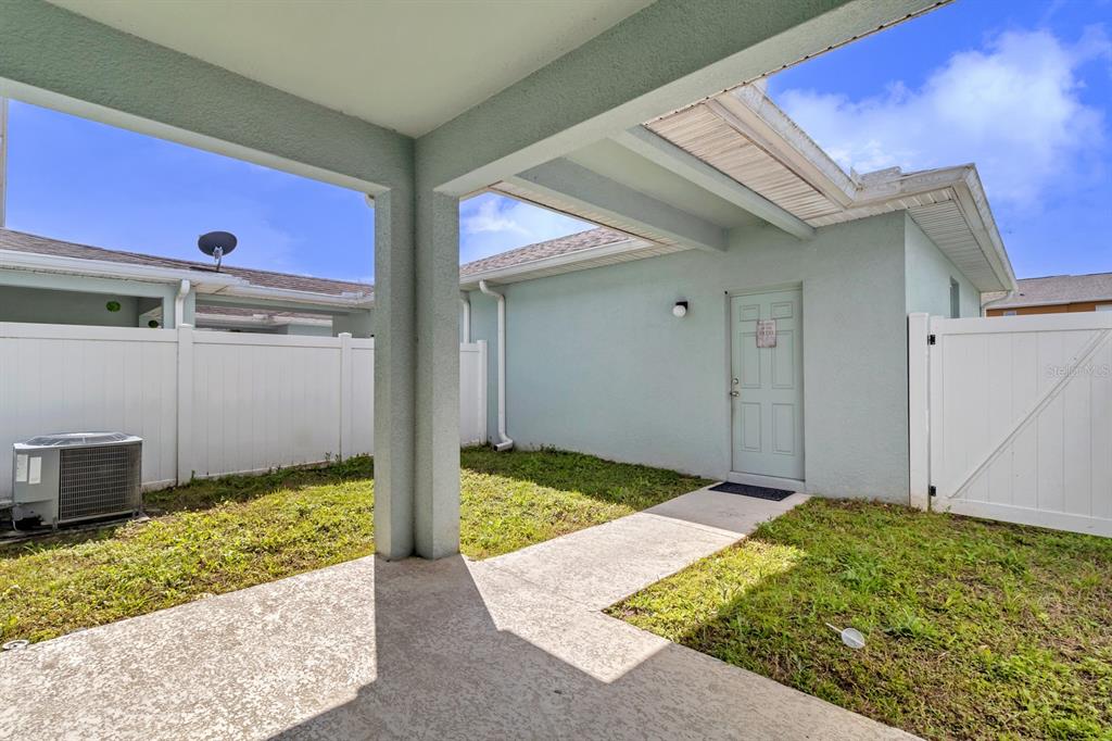 1578 Softshell Street St. Cloud, FL 34771 - Photo 5 of 27 a view of backyard with tub